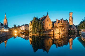 Fototapeta na wymiar Bruges canals during the blue hour with reflections