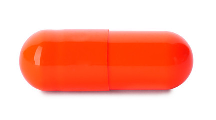 Color pill isolated on white. Medical treatment