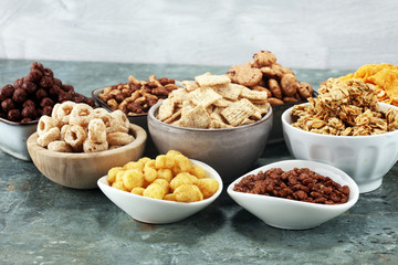Cereal. Bowls of various cereals for breakfast. Muesli with kids cereals.