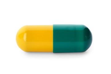 Color pill isolated on white. Medical treatment