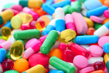 Assorted pills as background, closeup. Medical treatment