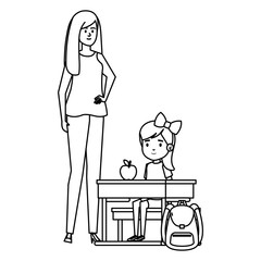 student girl in school desk with female teacher