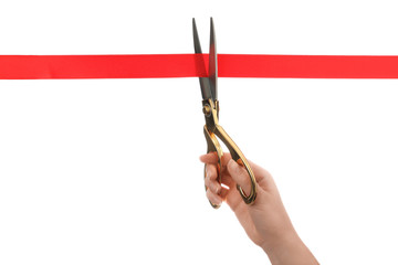 Woman cutting red ribbon with scissors on white background. Traditional ceremony - obrazy, fototapety, plakaty