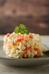 Chicken meat salad with mayonnaise and vegetables.