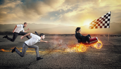 Fast businesswoman with a car wins against the competitors. Concept of success and competition.