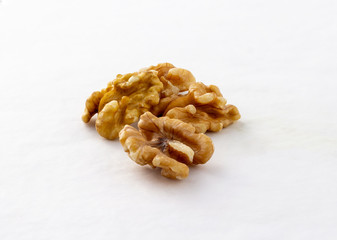 a group of walnuts on white background