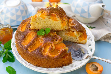Sweet homemade cake with fresh apricots for tea