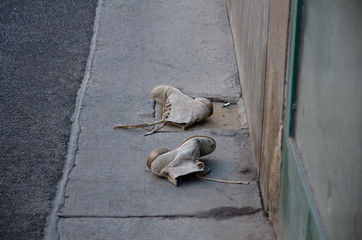 Abandoned shoes on the street