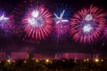 Red Fireworks light up the sky