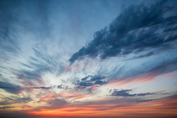 Dramatic sunset and sunrise sky with pink clouds