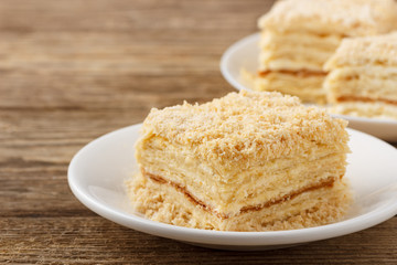 Cake Napoleon of puff pastry with sour cream. Close up.