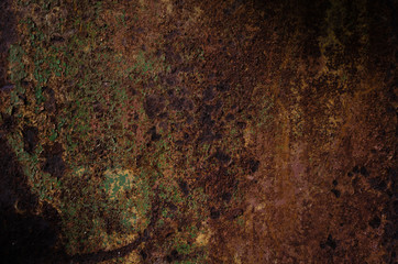 Rusted and oxidized metal texture. Background of the old ferrum sheet. Grunge wall with streaks of pitting. Concept of abstract corroded iron. Place for text