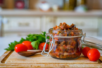Close up home made aubergine pate or spread in jar