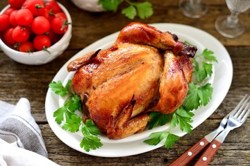 Roasted whole chicken. Delicious homemade food. Top view. Copy space. 