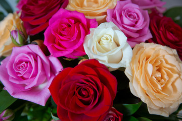 Beautiful wedding colorfull bouquet for bride. Beauty of colored flowers. Background . Beautiful bunch of Gerbera flowers with white, red, pink and yellow flowers .