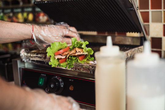 shawarma doner baked in an electric oven in a fast food restaurant.