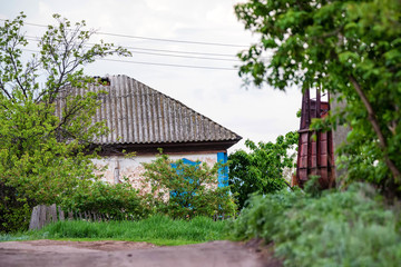 Old weathered rural hut made of stone in countryside