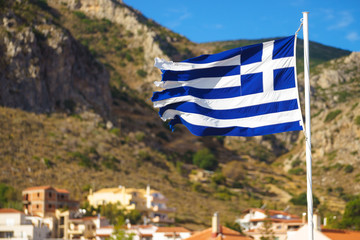 Greek flag against town