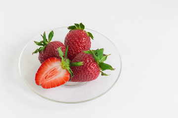 Delicious strawberry ice cream scoop with fresh strawberries on wooden background