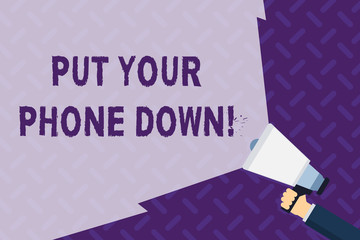 Text sign showing Put Your Phone Down. Business photo showcasing end telephone connection saying goodbye caller Hand Holding Megaphone with Blank Wide Beam for Extending the Volume Range