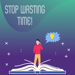 Writing note showing Stop Wasting Time. Business concept for advising demonstrating or group start planning and use it wisely Man Standing Behind Open Book Jagged Speech Bubble with Bulb