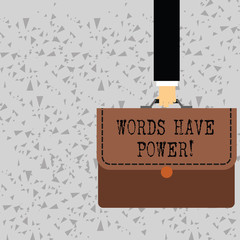 Word writing text Words Have Power. Business photo showcasing as they has ability to help heal hurt or harm someone Businessman Hand Carrying Colorful Briefcase Portfolio with Stitch Applique