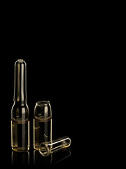 The open and whole ampoules with a medical preparation