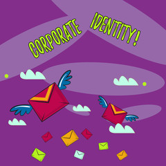 Word writing text Corporate Identity. Business photo showcasing firm or business presents themselves to the public Many Colorful Airmail Flying Letter Envelopes and Two of Them with Wings