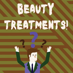 Conceptual hand writing showing Beauty Treatments. Concept meaning use of some form of treatment to improve someone s is beauty Businessman Raising Both Arms with Question Marks Above Head