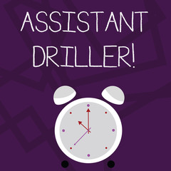 Writing note showing Assistant Driller. Business concept for to aid and assist the driller during rig operations Colorful Round Analog Two Bell Alarm Desk Clock with Seconds Hand photo