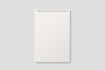 Blank realistic spiral bound notepad mockup on light grey background. High resolution. 
