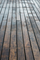 Background of woods arranged on aged tables of muted tones.