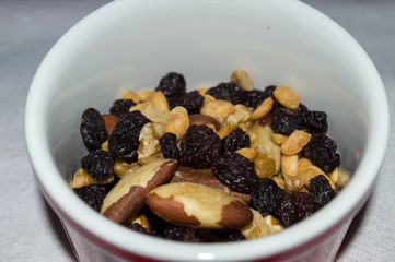 portion of oilseeds with Brazil nut, nuts, Soy and raisin in ramekin