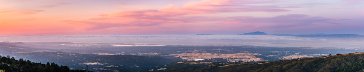 Panoramic view of Silicon Valley and the San Francisco bay area at sunset; Stanford University,...