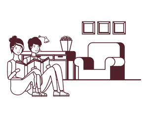 silhouette of couple with book in hands in living room