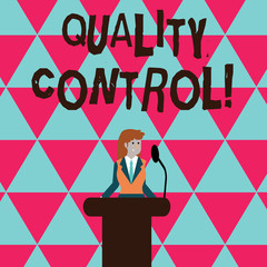 Conceptual hand writing showing Quality Control. Concept meaning system of maintaining standards in analysisufactured products Businesswoman Behind Podium Rostrum Speaking on Microphone