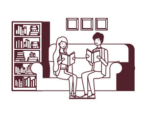 silhouette of couple with book in hands in living room