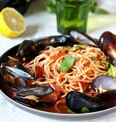 Pasta Spaghetti with mussels, tomato sauce. sea food meal. Mussels Marinara. Typical dish of Italian pasta.
