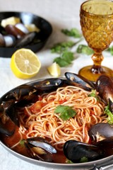 Pasta Spaghetti with mussels, tomato sauce. sea food meal. Mussels Marinara. Typical dish of Italian pasta.