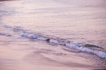 Waves rolling into shoreline