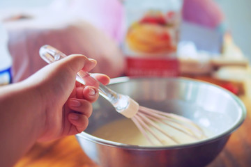 Baking cake dough in the kitchen for this holiday.