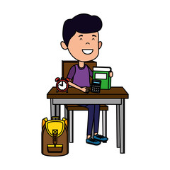 happy student boy with supplies seated in school desk