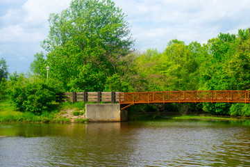 Fototapeta na wymiar Lakeside scenic views at Kennedy Park in Sayersville, New Jersey, on a partly cloudy day -01