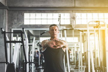 Sport man static stretching for warming up before doing wrist exercises training