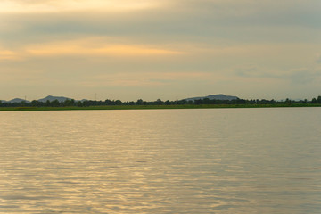 Bueng Boraphet Lake at sunset in Nakhorn Sawan Province, Thailand