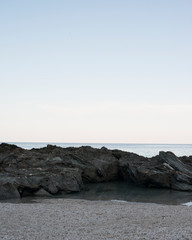 Fototapeta na wymiar Kayaking in Pilio greece Water and rocks