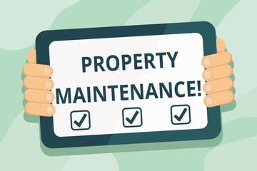 Handwriting text Property Maintenance. Conceptual photo refers to overall upkeep of real property or land Color Tablet Smartphone with Blank Screen Handheld from the Back of Gadget