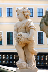 Statue and antique symbols of child - Zwinger (Der Dresdner Zwinger) is a palace in Dresden,...