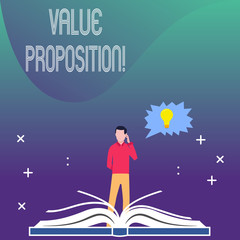Writing note showing Value Proposition. Business concept for innovation service intended make product attractive Man Standing Behind Open Book Jagged Speech Bubble with Bulb
