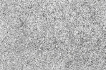 Fototapeta na wymiar Abstract foam concrete background, scuffs weathering gray with copy space for text or image. Horizontal texture of old pressed wood chips.